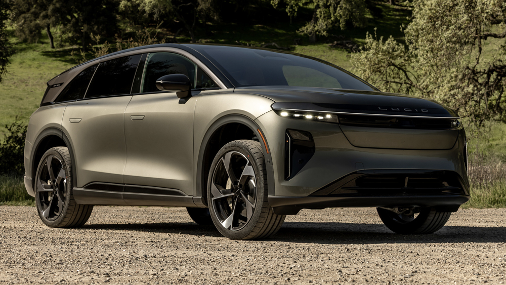 2026 Lucid Gravity Grand Touring parked in front of trees