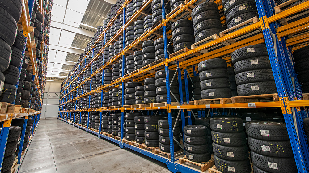 Tire warehouse with high shelf