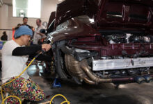Akira Nakai customizing 2006 Porsche Carrera S in live event