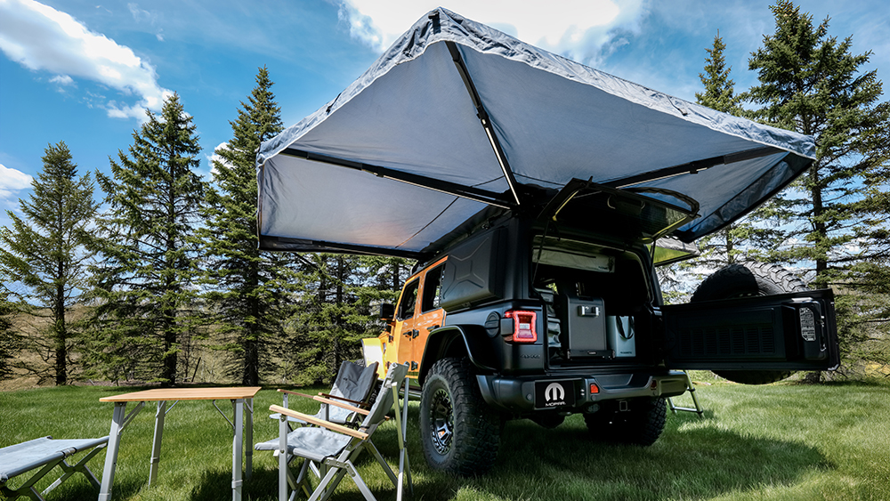 Awning and Rooftop Tent on Jeep Wrangler 4xe Sunchaser concept from rear