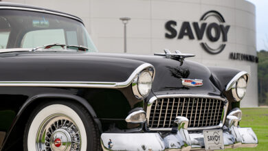 Classic car parked in front of Savoy Automobile Museum