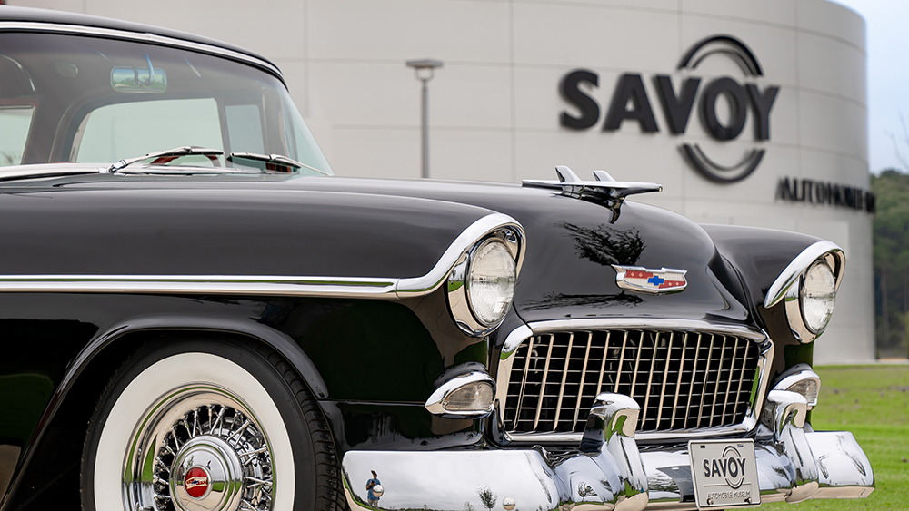 Classic car parked in front of Savoy Automobile Museum
