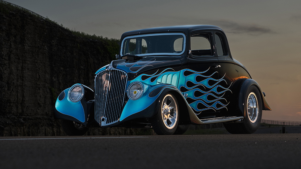 Custom 1933 Willys coupe parked at sunset