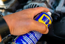 Mechanic using WD-40