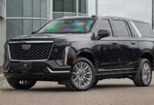 INKAS All-New 2025 Armored Cadillac Escalade parked in front of building