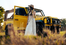 The Beach Patrol Defender 50 with person standing next to open door