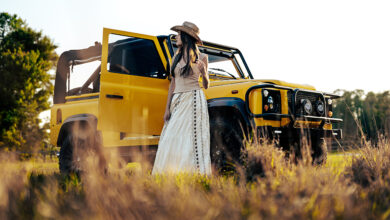 The Beach Patrol Defender 50 with person standing next to open door