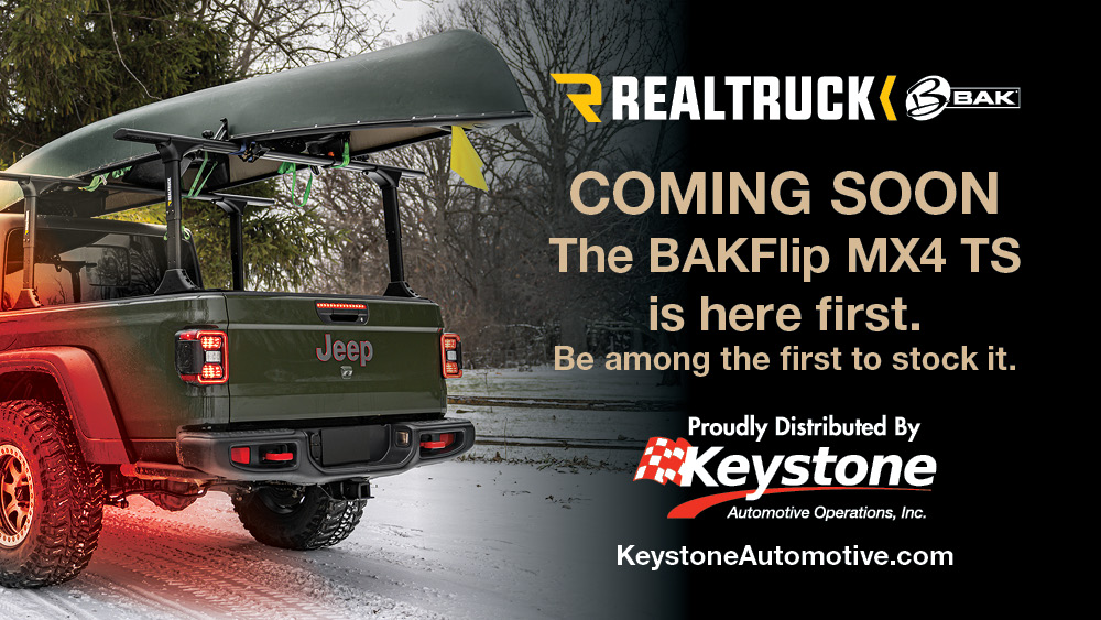 Keystone BAKFlip MX4 TS mounted on bed of a Jeep
