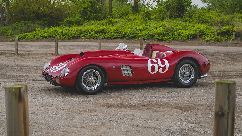 1955 Ferrari 375 Plus Spyder by Sutton parked near the beach