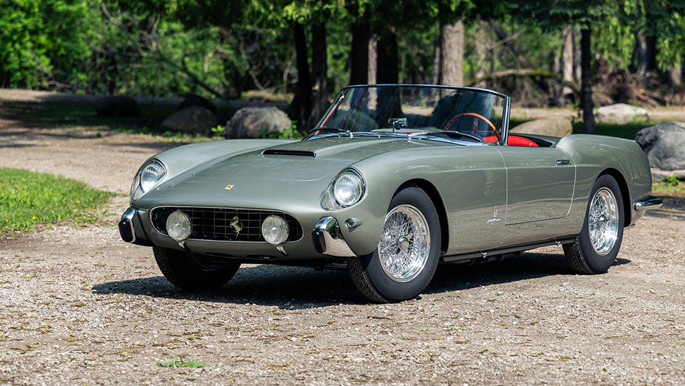 1958 Ferrari 250 GT Cabriolet Series I by Pinin Farina parked on dirt rouad with trees in the background