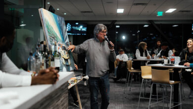 Bill Patterson during auction of one of his live paintings
