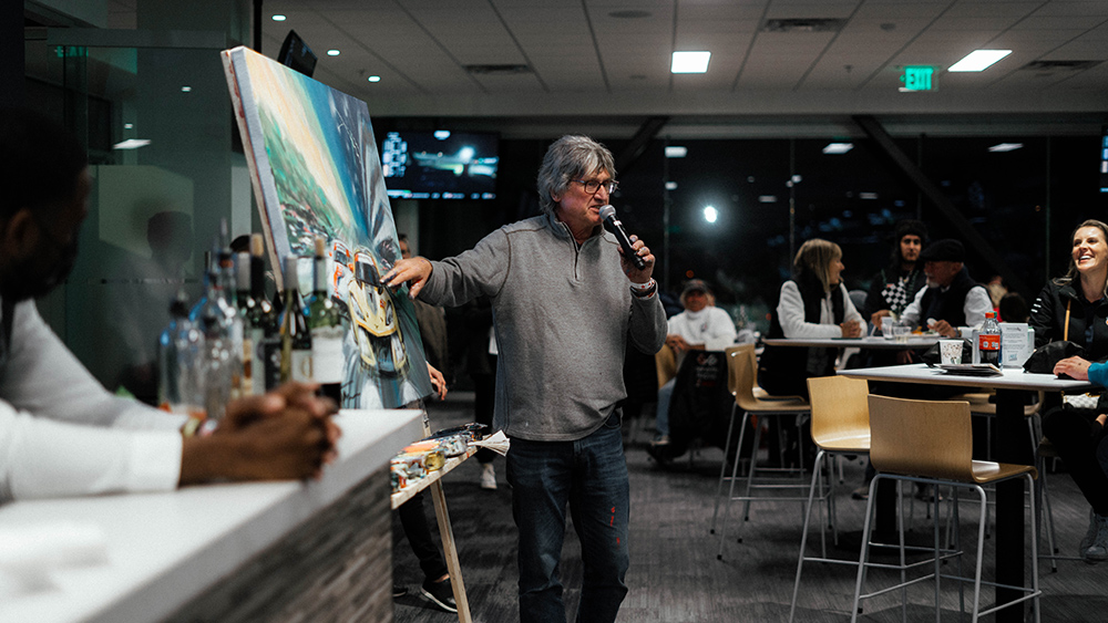 Bill Patterson during auction of one of his live paintings
