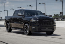 Black 2026 Ram 1500 HEMI V8 on racetrack