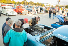 Cars and people at coffee Cars and Coffee show