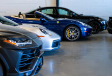 Collection of luxury cars in parking garage