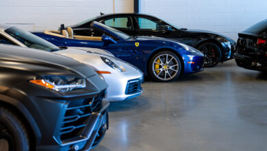 Collection of luxury cars in parking garage