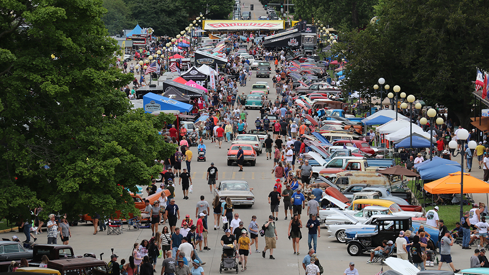Good Guys car show with street lined with cars and people
