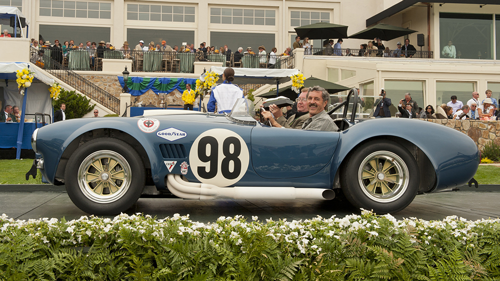 The 1965 Shelby Cobra 427 Prototype Competition Roadster of Harry Yeaggy crosses the awards ramp at the 2012 Pebble Beach Concours d'Elegance