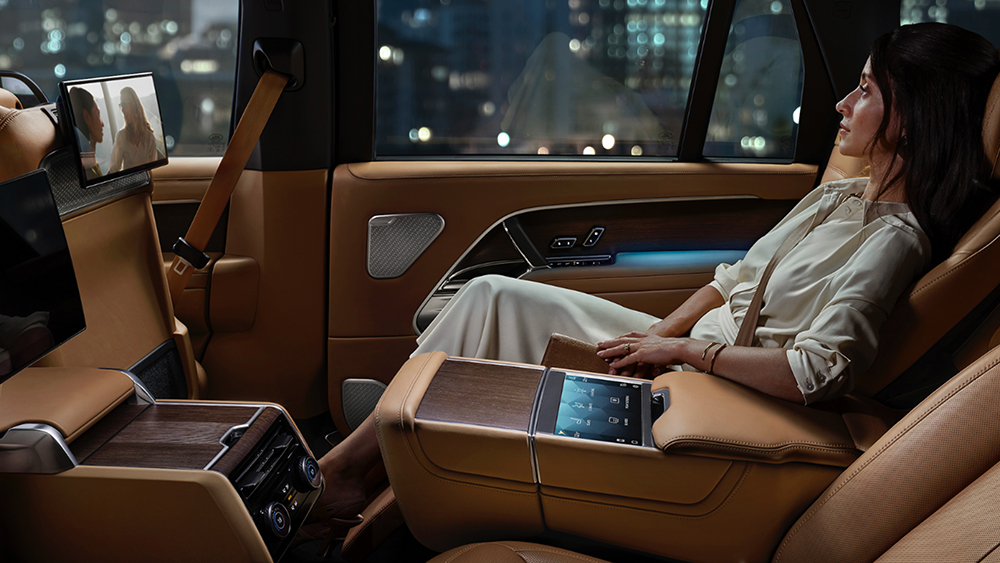 Person sitting in car listening to music