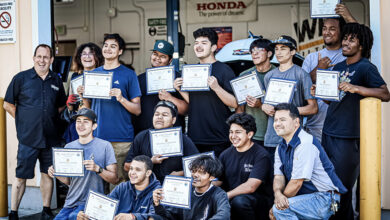 Students holding certificates earned through Acceler8
