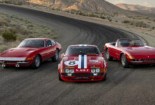 Three Iconic Ferrari Daytonas parked on road