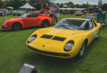Yellow Lamborghini Miura at outdoor car show