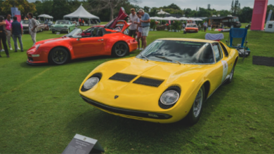 Yellow Lamborghini Miura at outdoor car show