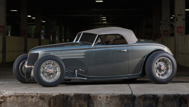 1936 Ford Roadster parked under bridge