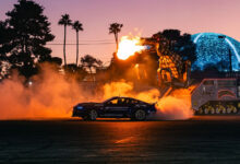 SEMA Fest car drifting at dusk