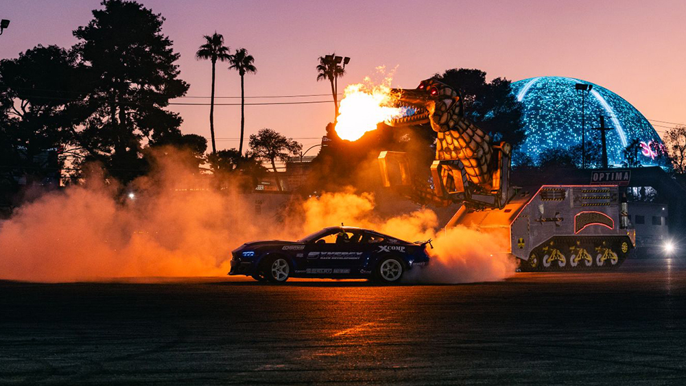 SEMA Fest car drifting at dusk