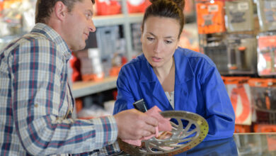 man buys brake wheel in auto parts store