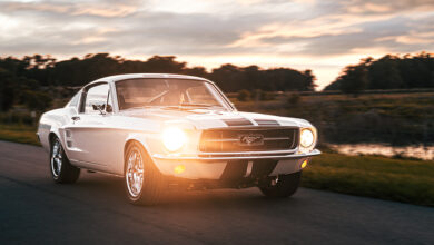 ECD Project Ghost '67 Ford Mustang driving on road at dusk