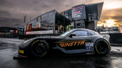 Ginetta GT2 race car parked in front of building