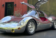 HELIOS BY CHRISTOPHER RUNGE parked in front of barn
