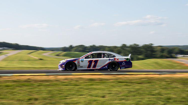 Historic #11 race car on racetrack