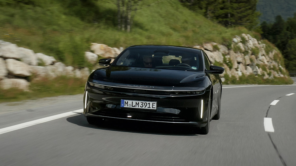 The Lucid Air Grand Touring driving on Alpine roads, highways, and secondary roads.