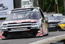 Historic race cars on racetrack