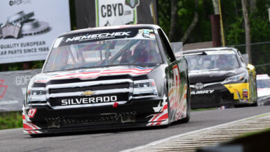 Historic race cars on racetrack