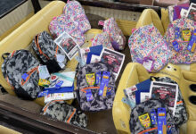 Car full of backpacks and school supplies