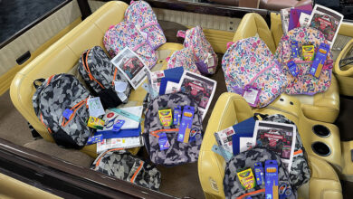 Car full of backpacks and school supplies