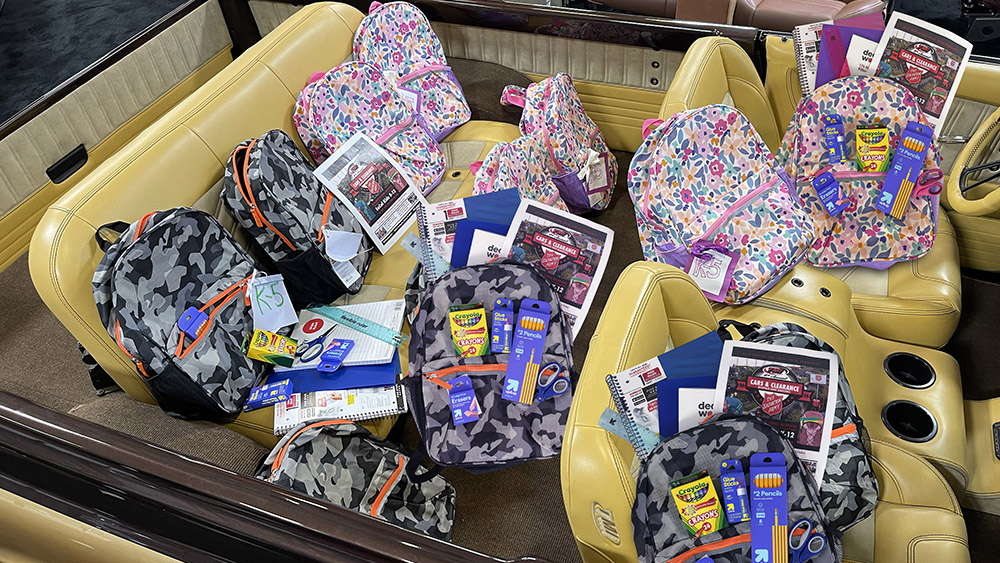 Car full of backpacks and school supplies