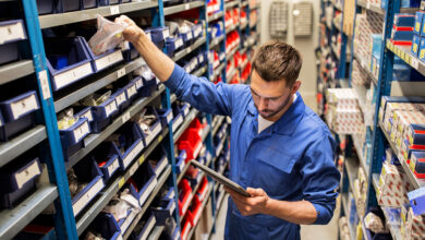 auto mechanic or smith with tablet pc at workshop