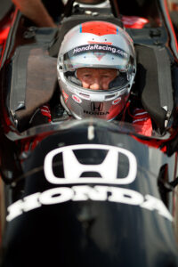 Mario Andretti in cockput of race car