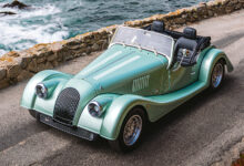 Morgan Plus Four parked next to ocean