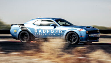 Race car with Radford Racing School logo on side