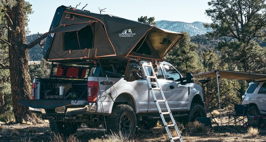 rooftop tents tuff stuff overland on white pickup at campsite