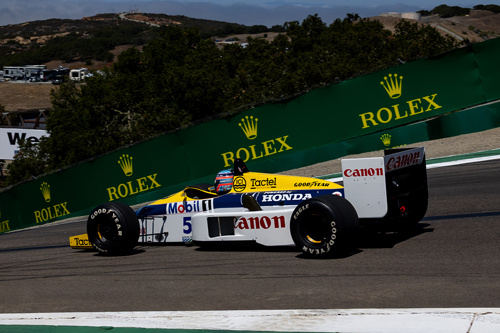 Takuma Sato piloting the 1986 Williams FW-Honda down the corkscrew for the Formula One exhibition