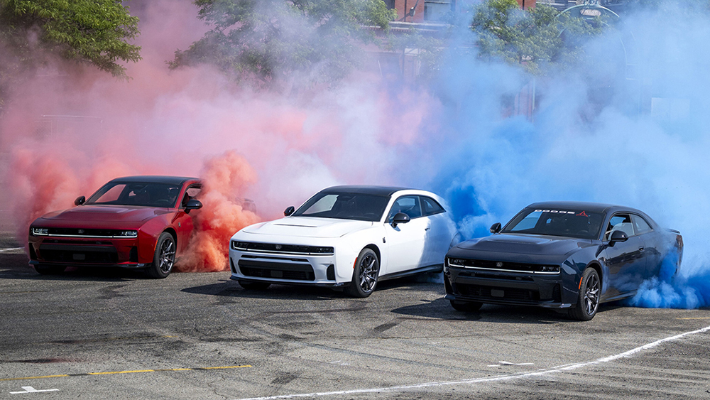 Three 2026 Sixpack Charger Scat Packs smoking their tires at Roadkill Nights Powered by Dodge