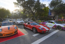 Three lines of cars on Monterey Ocean Avenue Car Week