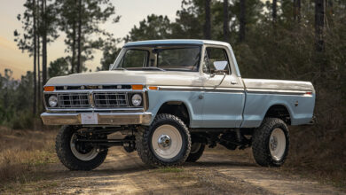 Velocity Dentside Ford truck parked at angle on dirt road